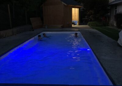An installed Otter Pool at night